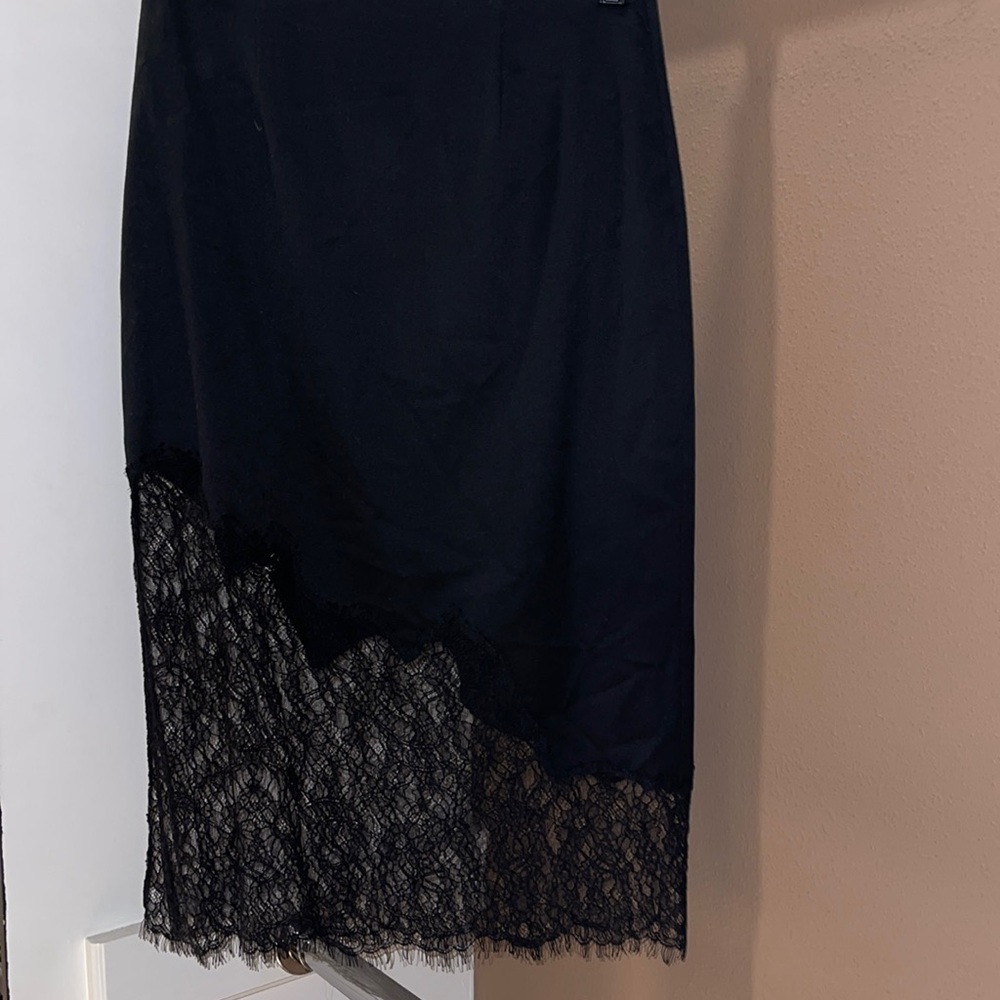 COPY - Black pencil skirt with lace design.